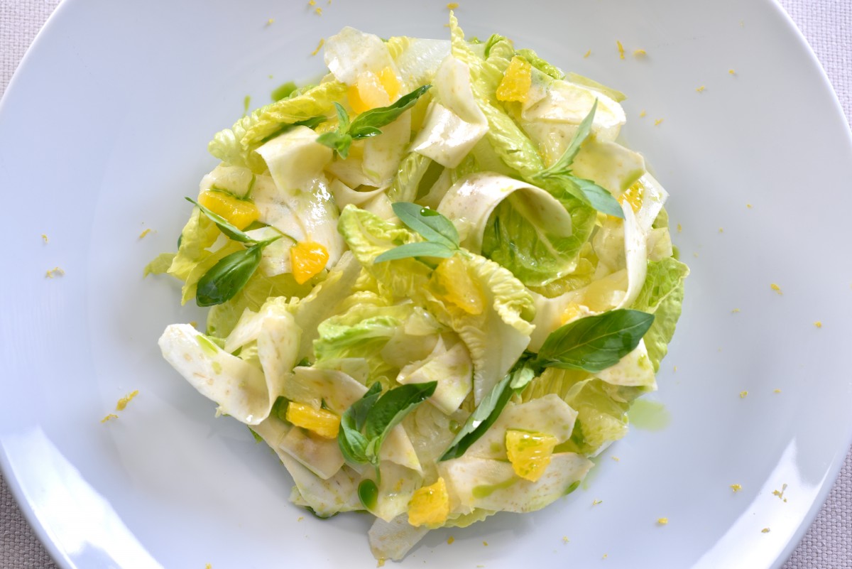 Artichoke salad served with citrus, lemon dressing & basil oil